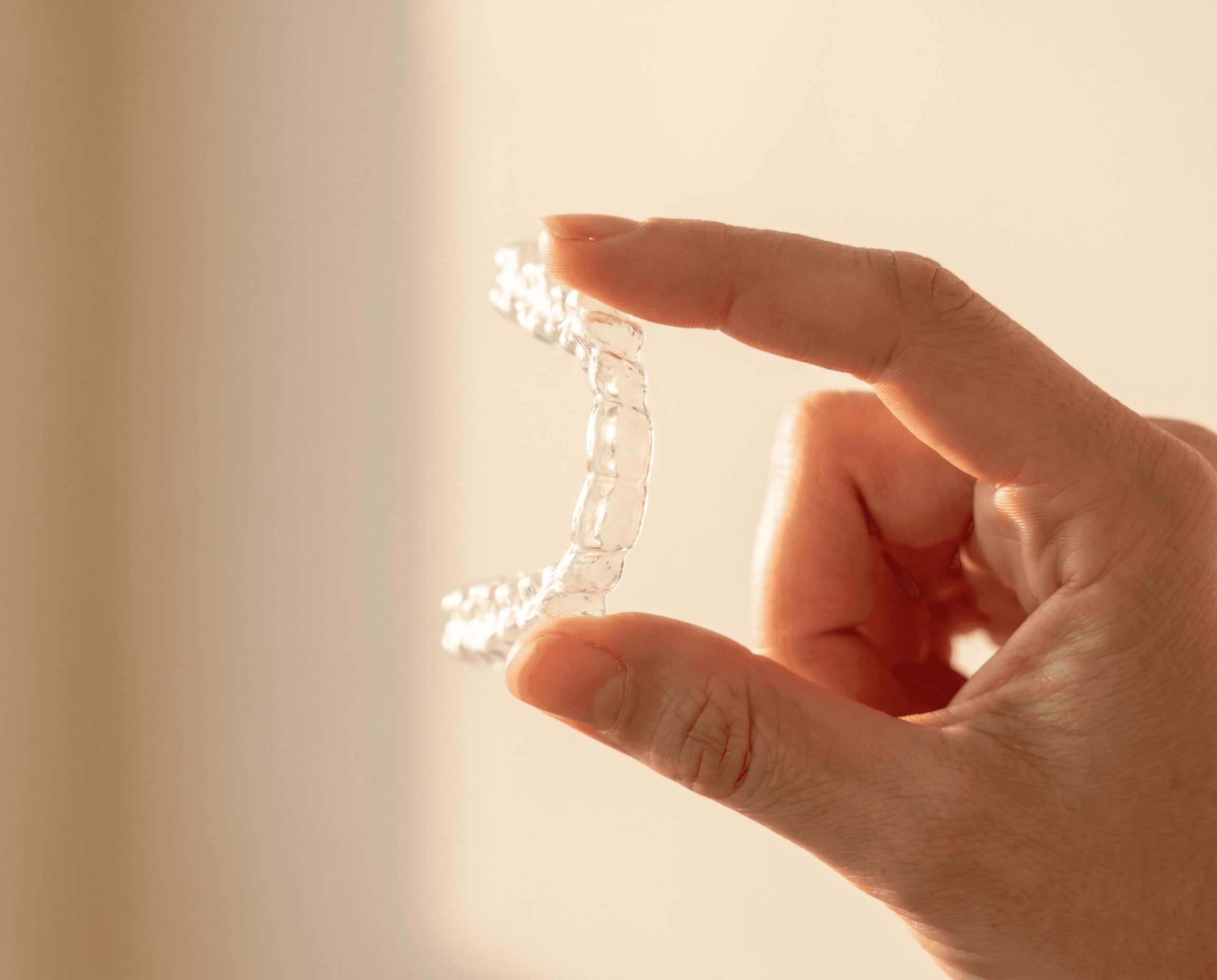 Patient previewing their Invisalign treatment via 3D iTero scan